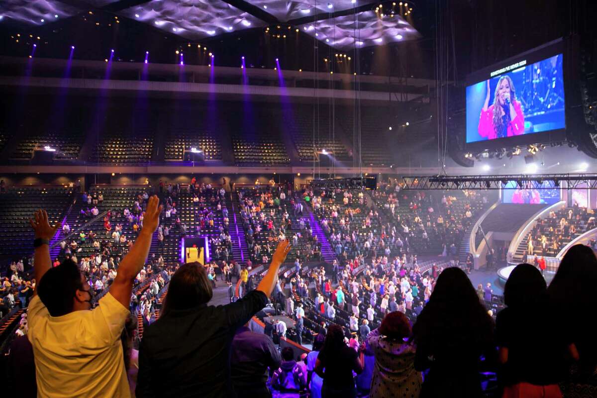 People worship during the 8:30 a.m. service at Lakewood Church during the first day of reopening for in-person services on Sunday after being closed since March on Sunday, Oct. 18, 2020.