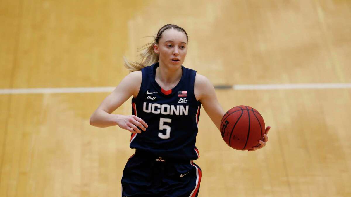 UConn guard Paige Bueckers (5) dribbles the ball against Seton Hall during the second half of an NCAA basketball game on Tuesday, Dec.15, 2020, in South Orange, N.J. (AP Photo/Noah K. Murray)