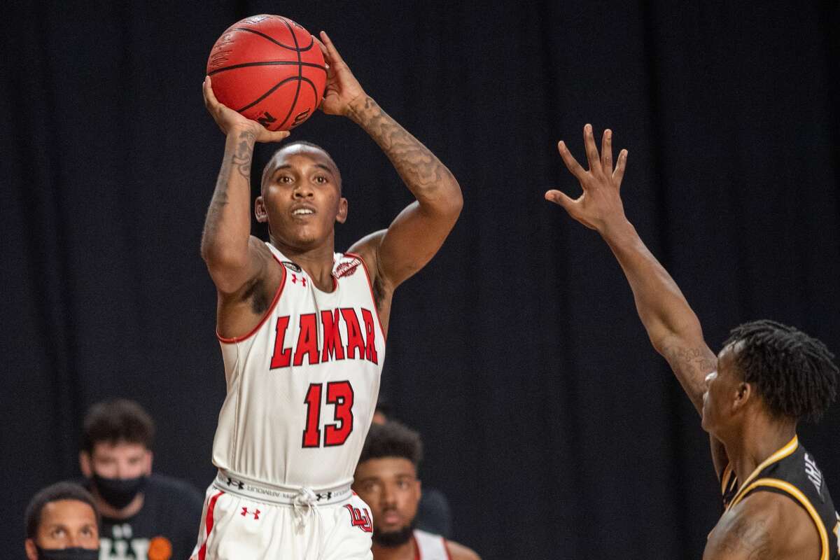 Cardinals Davion Buster (13) pulls up for a shot in the second half. The Lamar Cardinals men's basketball team hosted the Southern Mississippi Golden Eagles at the Montagne Center Tuesday night. Photo made on December 15, 2020. Fran Ruchalski/The Enterprise