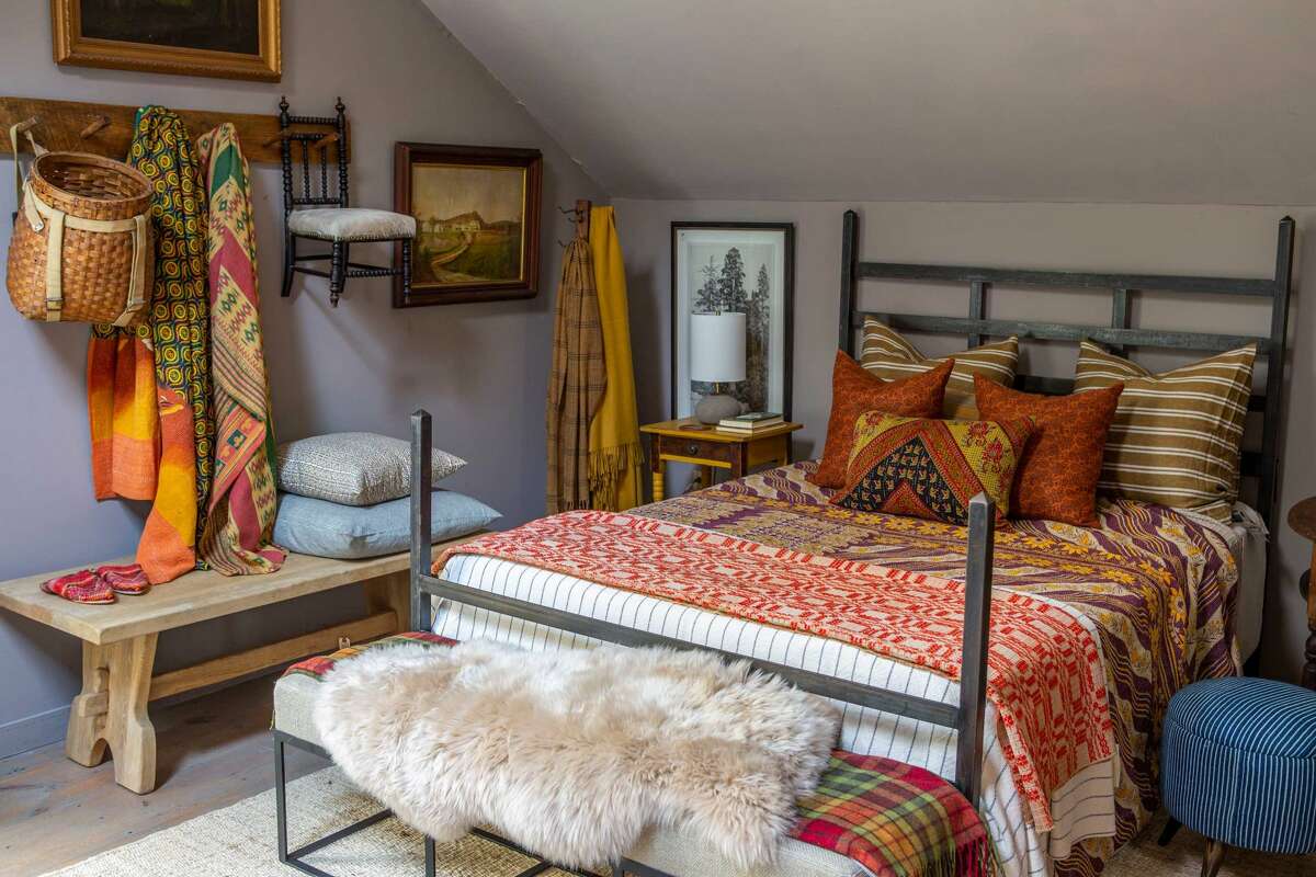 Pillows, blankets, and brightly colored objects are another way to add oomph to a room, says Joan Osofsky, founder and owner of Hammertown furniture and design stores.