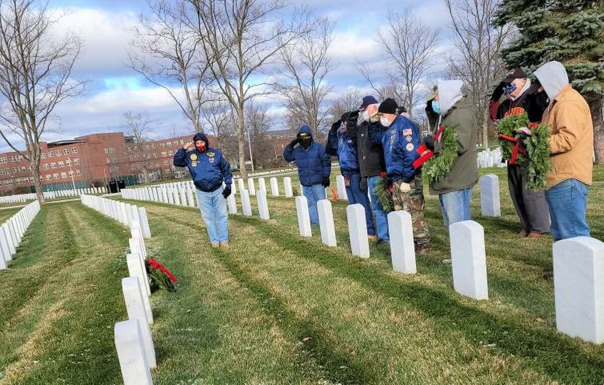 Members of Middletown’s Veterans of the Vietnam War gathered at the Connecticut State Cemetery for a wreath laying for their departed comrades Dec. 6. “A hand salute and a prayer was rendered for each of the 13 who had served honorably for their their country’s freedoms,” according to Jerry Augustine, VVW chaplain. Taps was played at the conclusion of the ceremonies. Among the veterans, family members and friends who attended were past commanders Mike Rogalsky, Augustine and Joe Labbadia; Vice Commander Bob Santangelo, Dave Pina, Larry Rostosky, Brian Dudek, Marc Yoingquist, Frank Green, Lou Urso, Roger and Linda Guild, Keith and Marcie Clark, and Bette Pear. Special thanks goes to Jon Worley, who played taps.