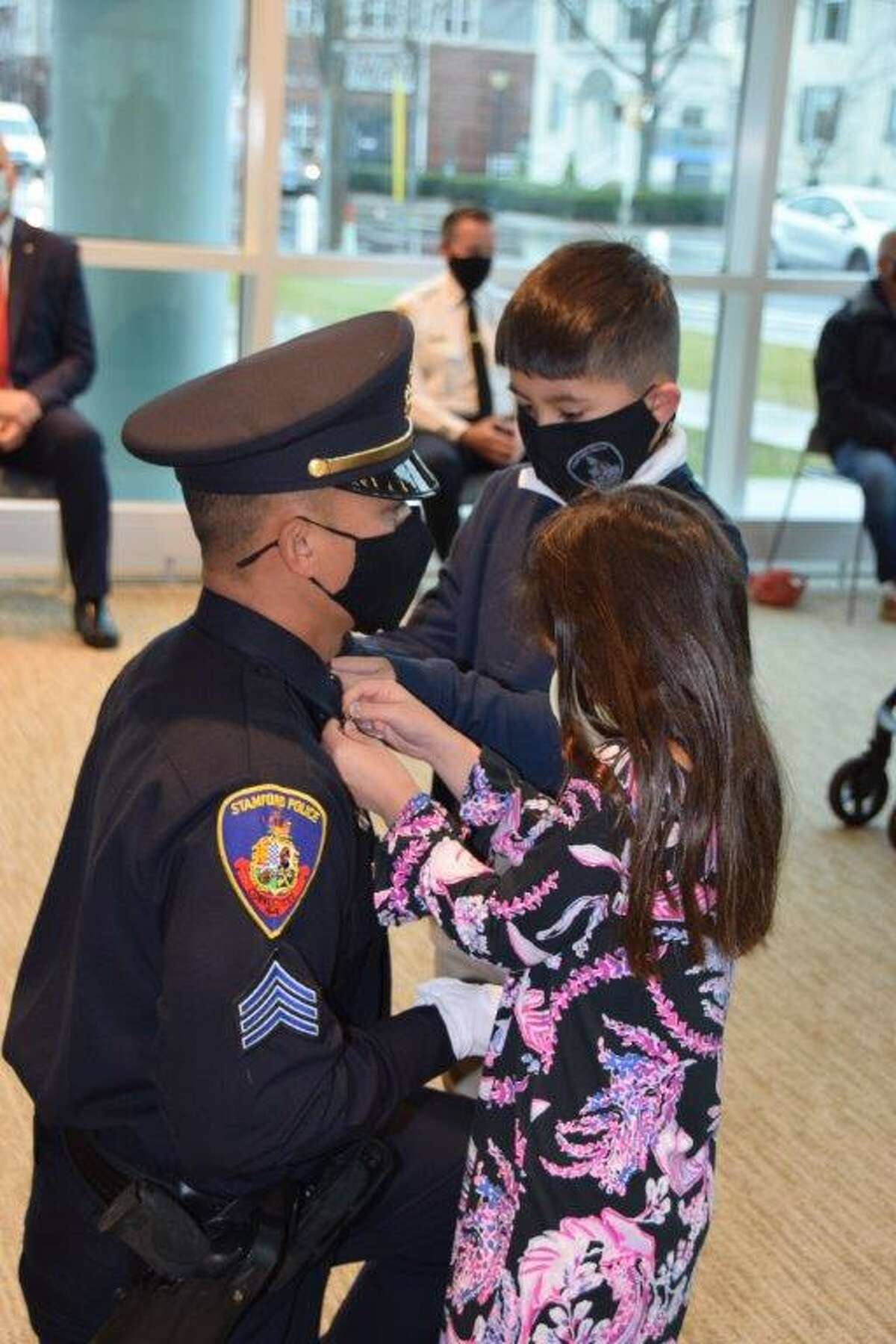 Newly minted Sgt. Michael Nguyen has his gold chevrons pinned to his collar by his son Michael Jr., 9, and daughter Kyla, 7, at a promotion ceremony held at Stamford police headquarters on Dec. 14, 2020. Felman-Merced, 32, a native of Beacon, N.Y., has been in the department for eight years. “It is a blessing. It’s almost a little surreal,” Felman-Merced said when asked how he felt about getting his stripes. “It is ... everything it represents and being able to do it. And the amount of time on and being a part of the units I have been a part of, it really is a blessing.”