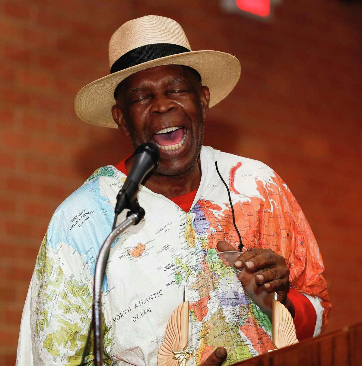 Cecil L. Shaw, Jr., who served as grand marshal of the annual Leon Tolbert Annual Black History Month Parade, sings at Booker T. Washington Junior High School, Saturday, Feb. 8, 2020, in Conroe.
