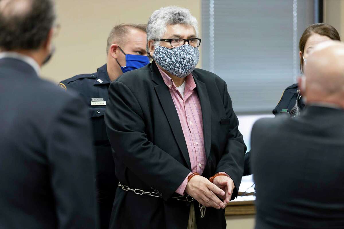 Manuel La Rosa-Lopez is escorting out of courtroom after his sentencing in downtown Conroe, Wednesday, Dec. 16, 2020. La Rosa-Lopez pleaded guilty last month to several counts of indecency with a child accepting a 10 year sentence.