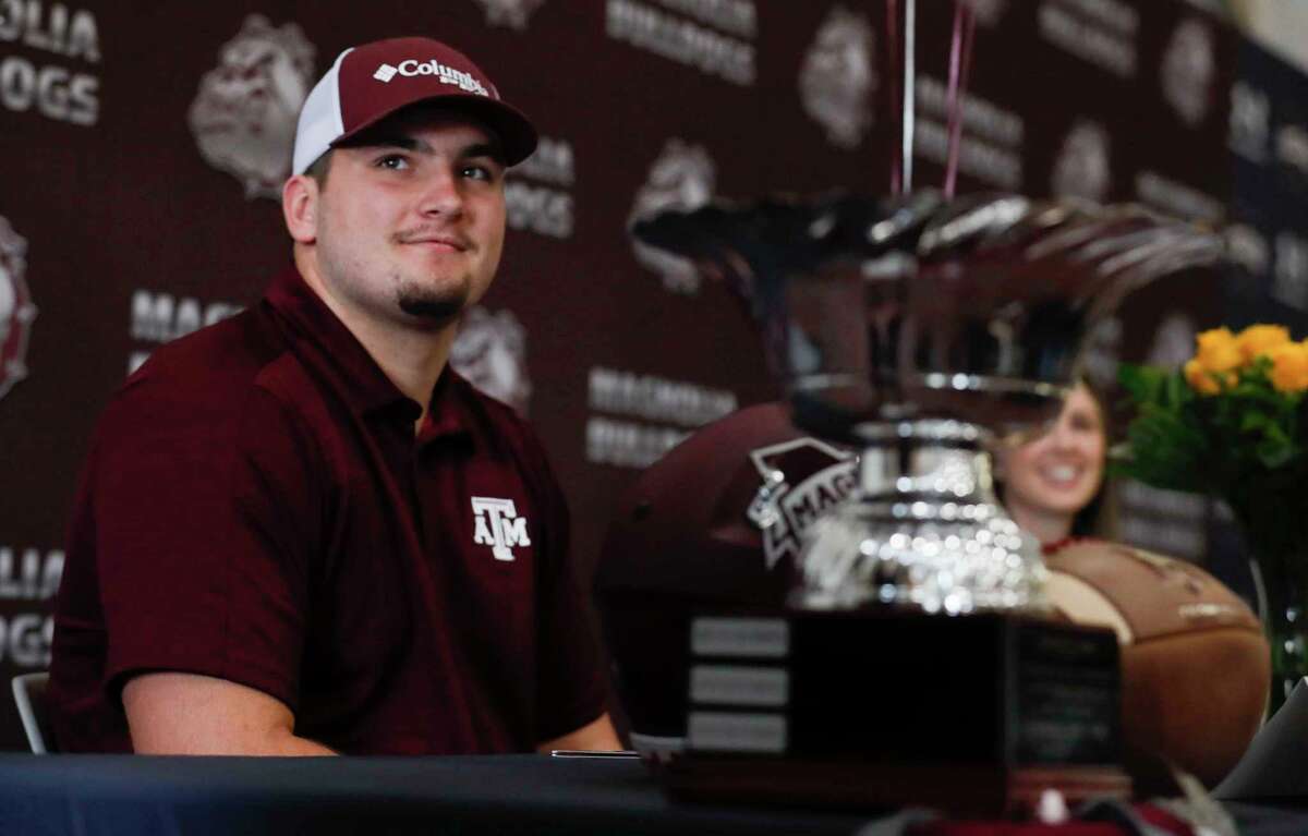 Matthew Wykoff signed to play football for Texas A&M during a signing ceremony at Magnolia High School, Wednesday, Dec. 16, 2020, in Magnolia.