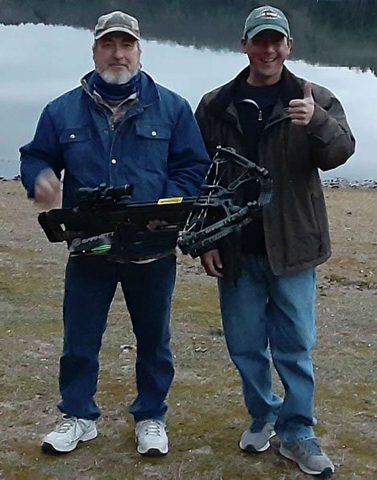 Fred Llewellyn (right), Baldwin rotarian and organizer of the George King Memorial Michigan Fair Chase contest, is pictured with first-place winner Louis DeCheney of Baldwin. (Courtesy photo)