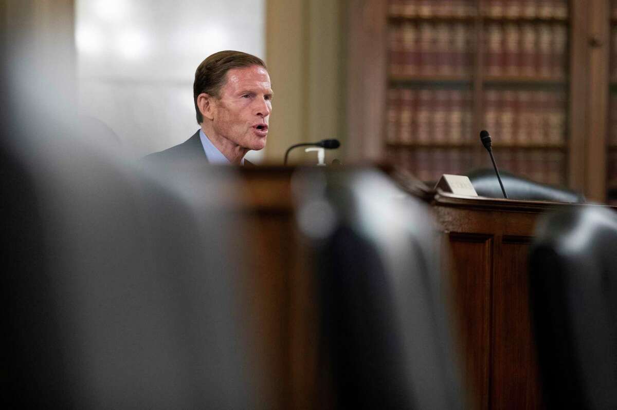 Senate Special Committee on Aging member Sen. Richard Blumenthal, D-Conn., speaks behind empty chairs during a hearing to examine caring for seniors amid the COVID-19 crisis on Capitol Hill, Thursday, May 21, 2020, in Washington.