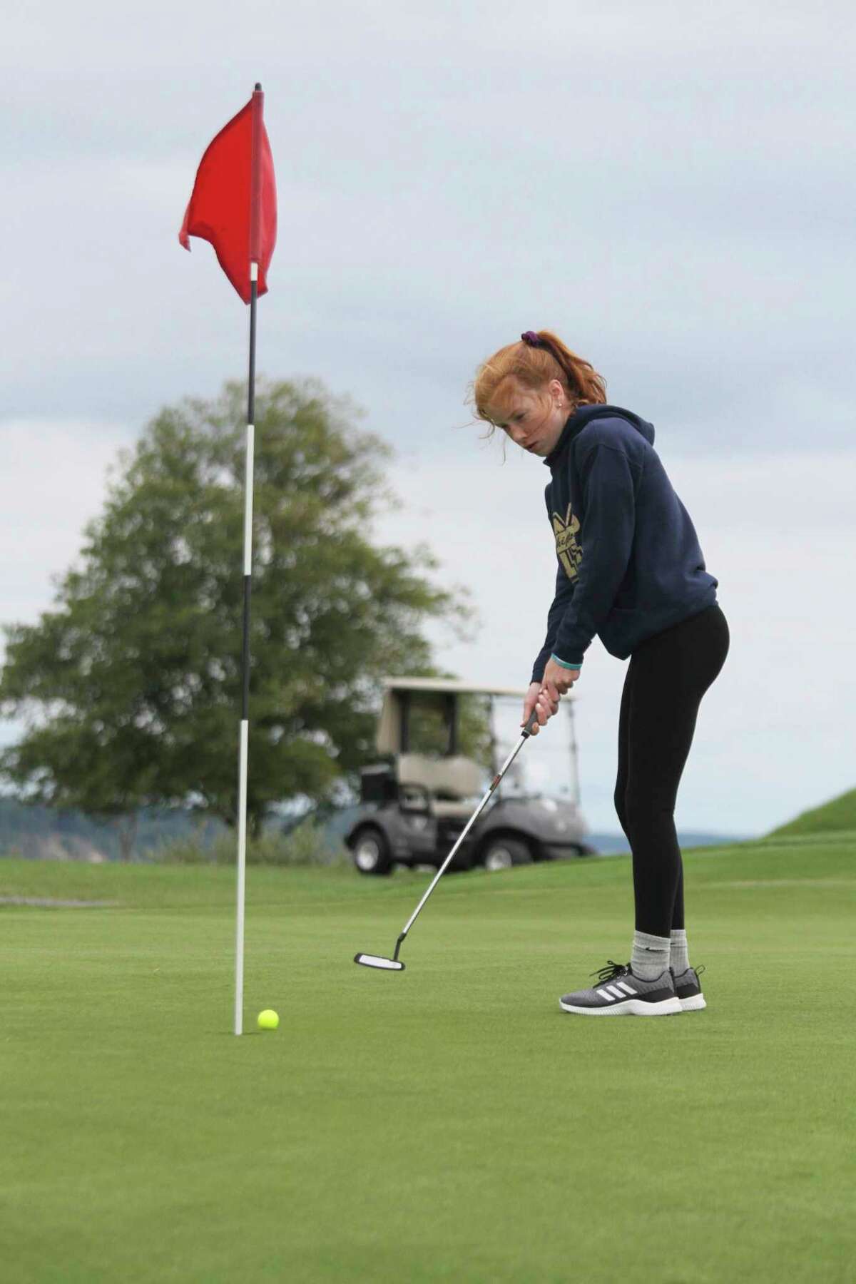 Manistee's Kendal Waligorski sinks a putt this past season. The Chippewas were recently named academic all-state. (News Advocate file photo)