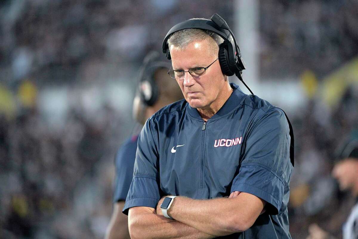 Connecticut head coach Randy Edsall walks along the sideline during the first half of an NCAA college football game against Connecticut Saturday, Sept. 28, 2019, in Orlando, Fla.