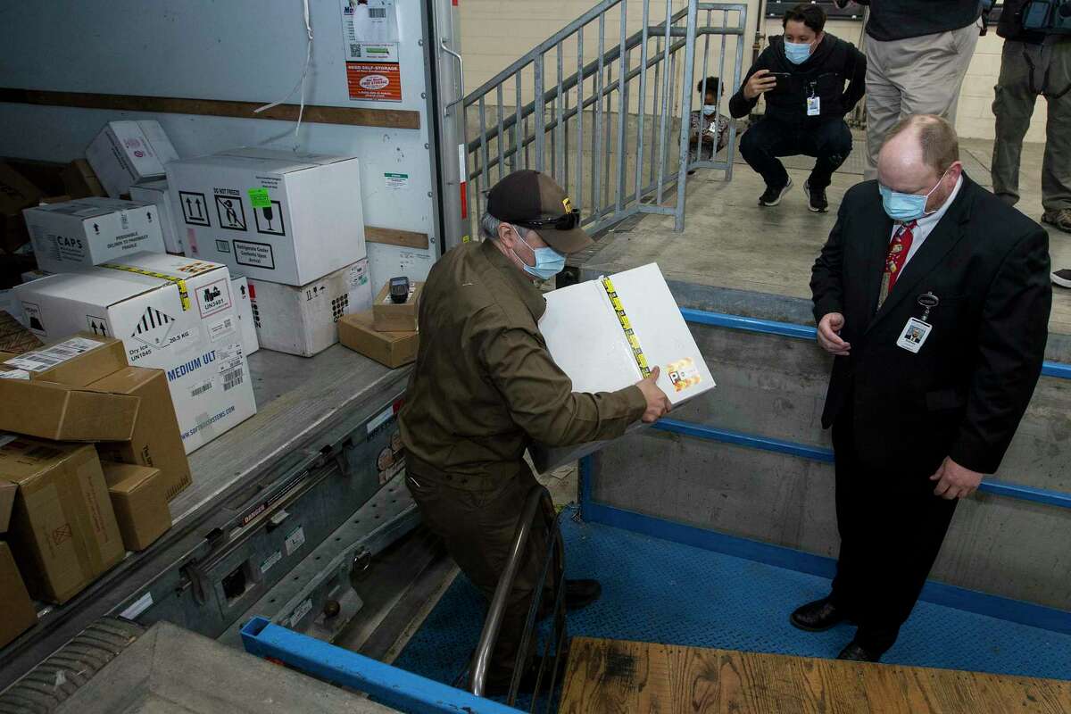 Delivery services working overtime to ship vaccines and presents