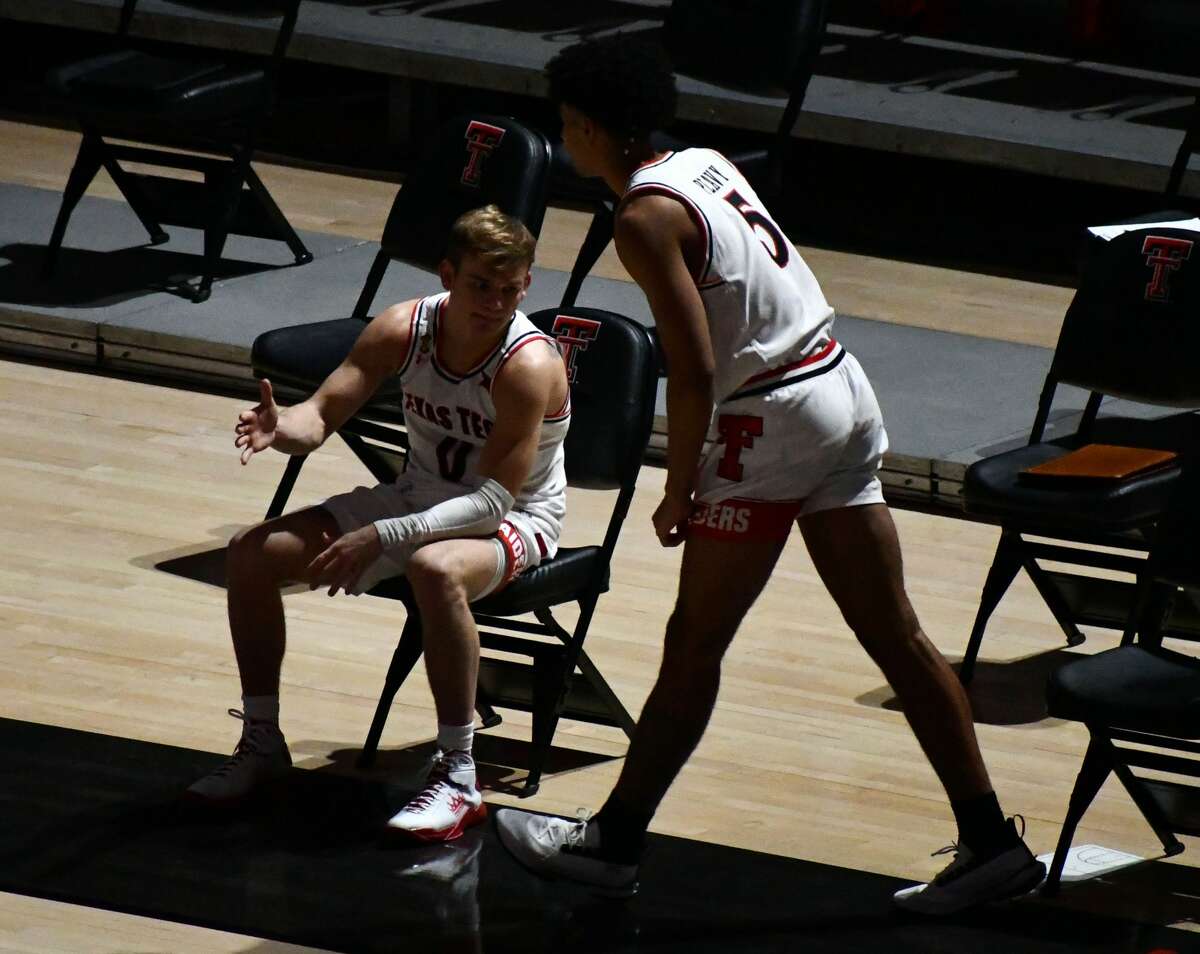 The 14th-ranked Texas Tech Red Raiders suffered a 58-57 loss to 5th-ranked Kansas in a Big 12 men's basketball game on Dec. 17, 2020 in the United Supermarkets Arena in Lubbock.