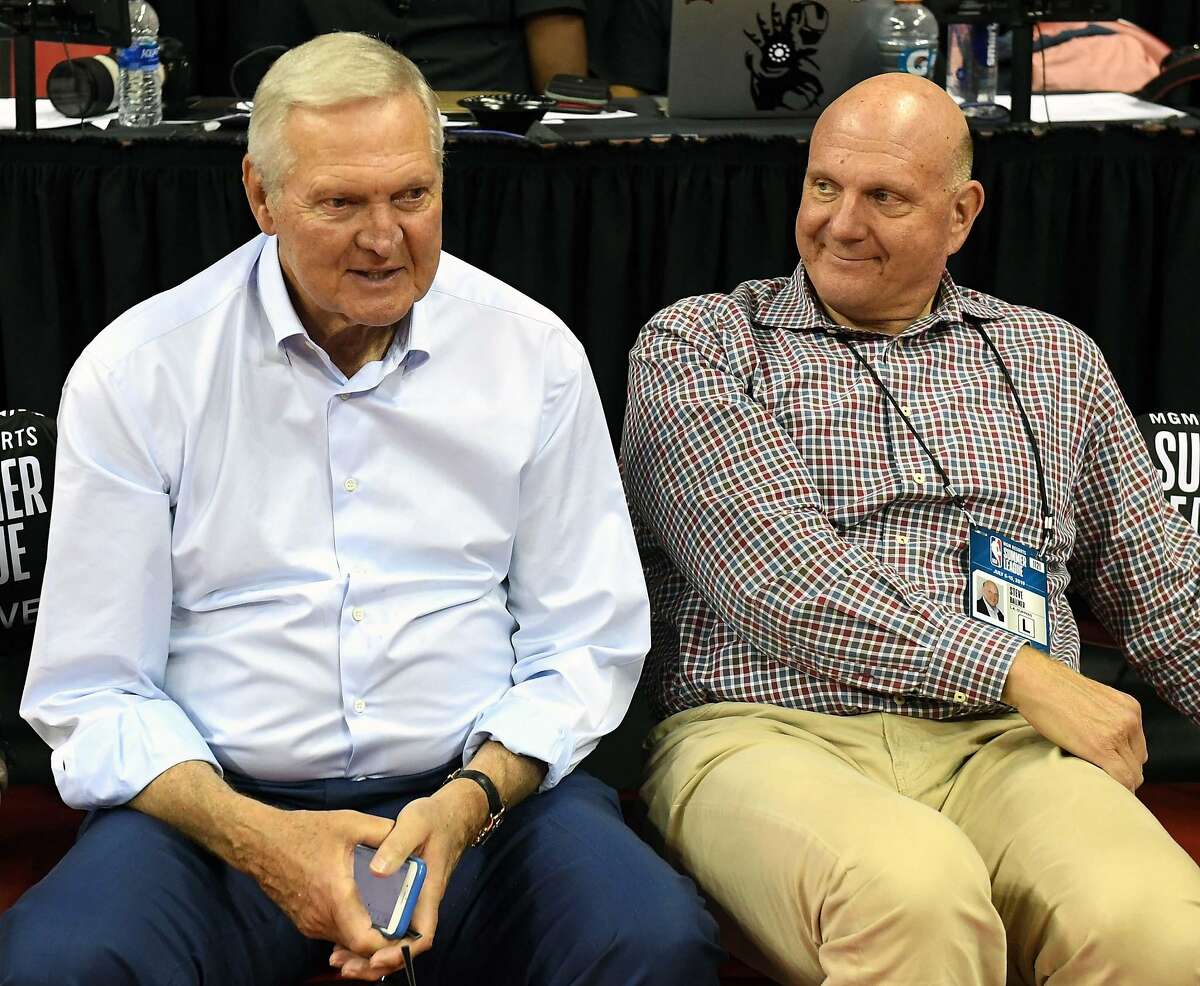 Clippers consultant Jerry West (left), with owner Steve Ballmer, denied offering $2.5 million to lure Kawhi Leonard.