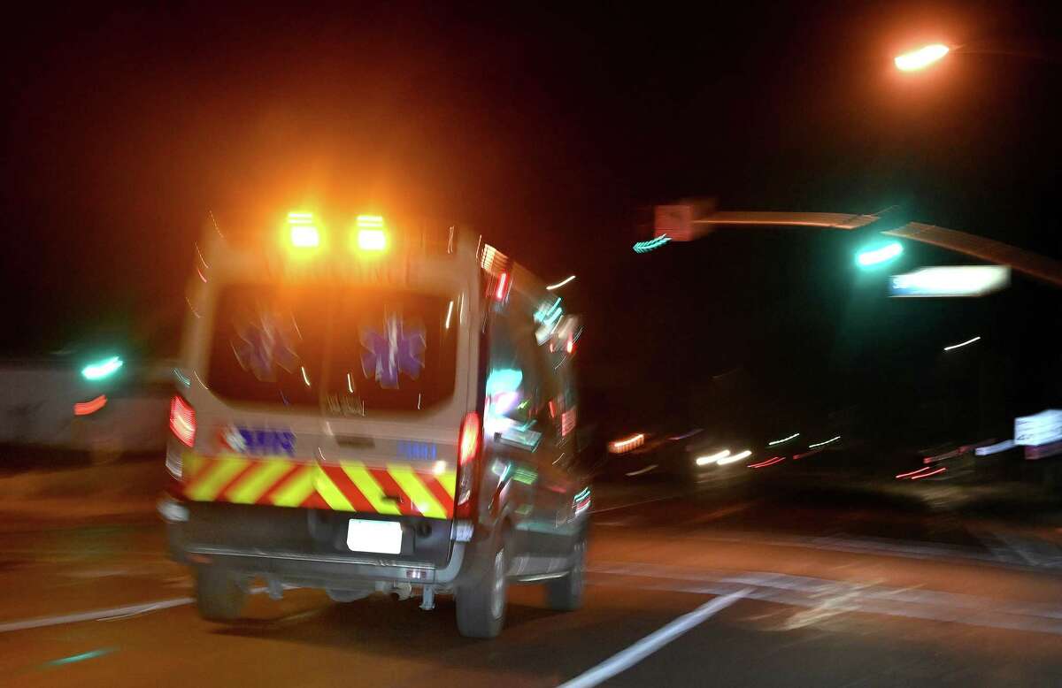 An ambulance leaves a suburban area en route to the nearby St. Mary Medical Center in Apple Valley, Calif. on December 12, 2020.