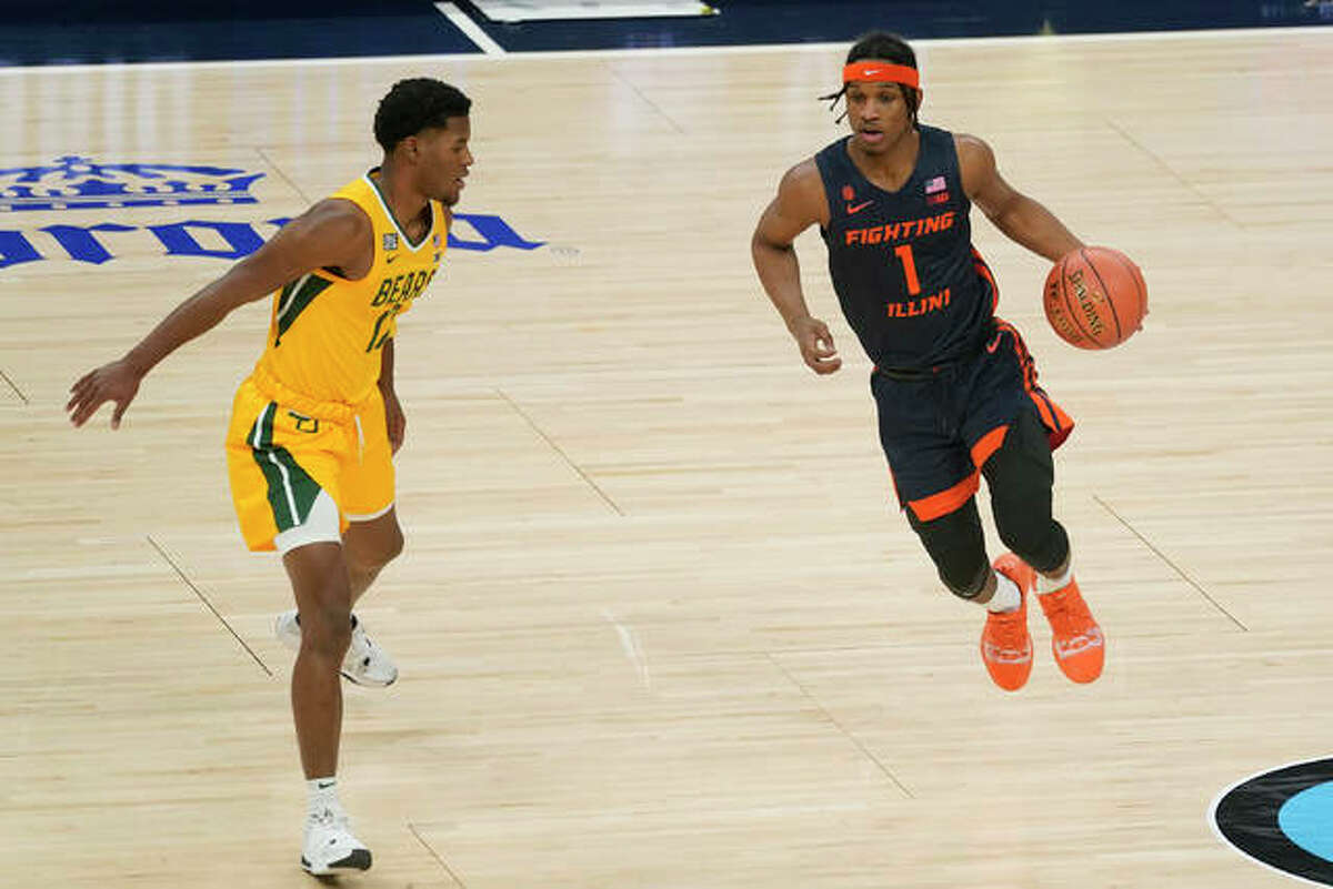 Illinois’ Trent Frazier (1) is defended by Baylor’s Jared Butler (12) during the first half of an NCAA college basketball game, Wednesday, Dec. 2, 2020, in Indianapolis.