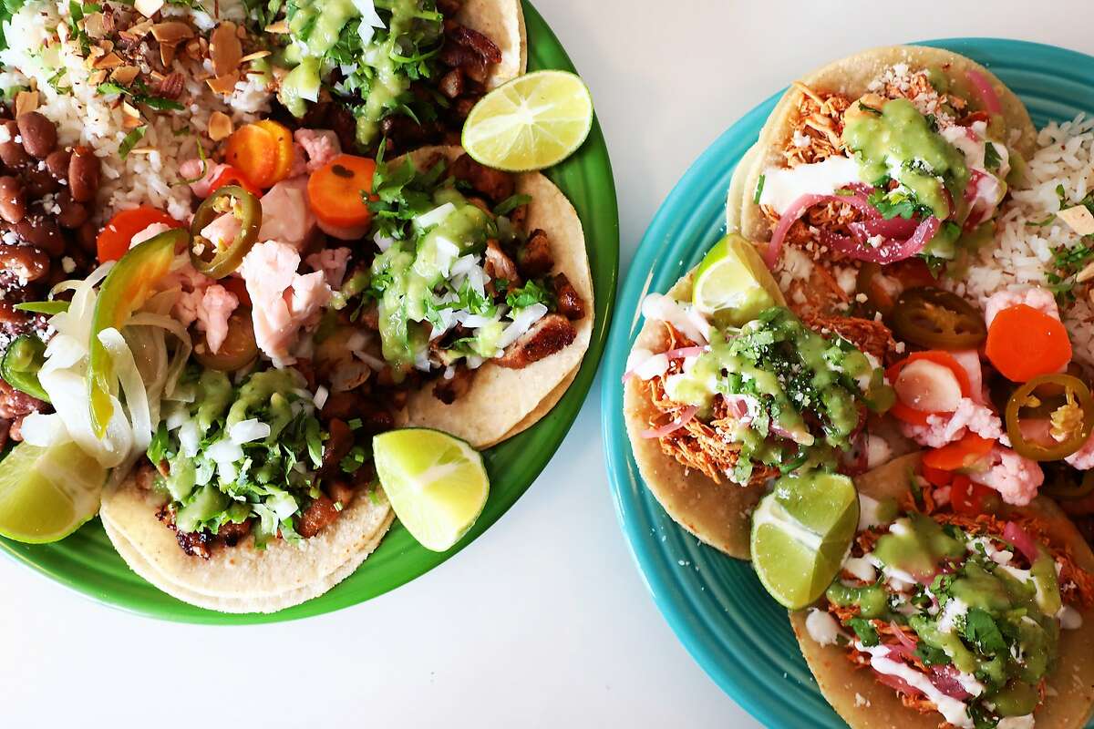 Mushroom (left) and chicken tinga tacos are among the options at Tato, a San Francisco restaurant offering pay-what-you-can tacos on Fridays in the Bayview.