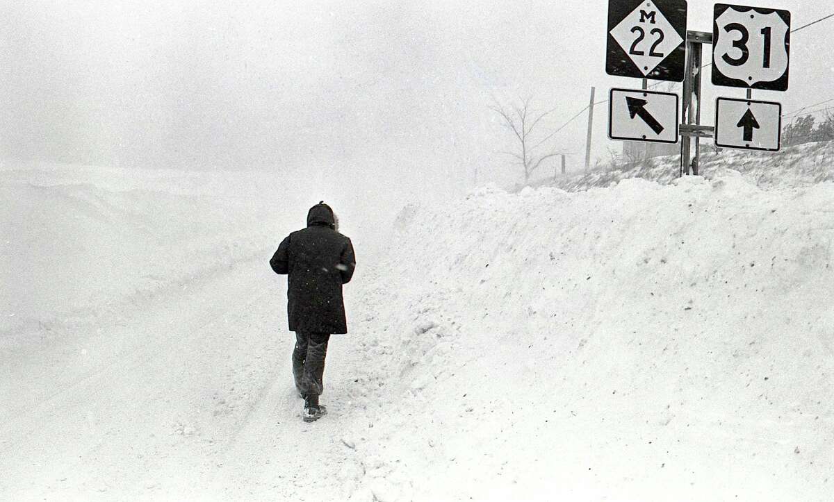 This photo shows a view walking down M-22 after the blizzard of 1978. (Manistee County Historical Museum photo)