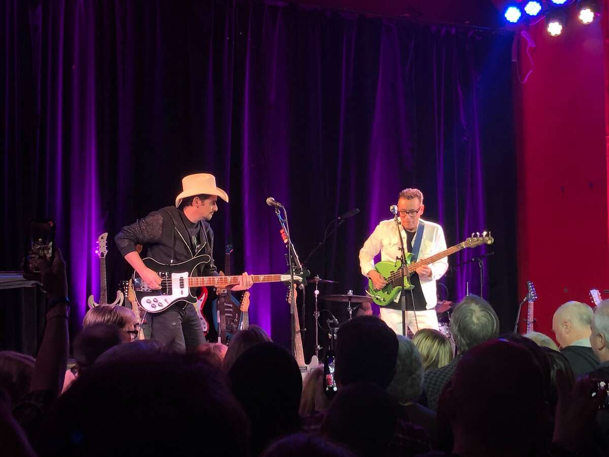Country music star Brad Paisley (left) joins Fred Armisen for a bass guitar duet at a Comedy for Guitar Players show at the Chapel in San Francisco on Friday, Jan. 24, 2020.
