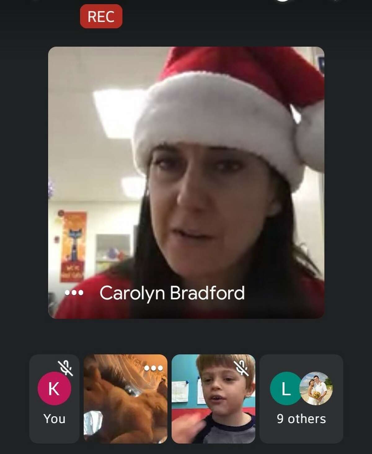 Carolyn Bradford, a first grade teacher at Onekama Consolidated Schools, leads a Google Meet in which students were encouraged to wear pajamas and drink hot cocoa as Bradford read "The Polar Express." Remote learning has been difficult for families without internet access or someone to watch the students.