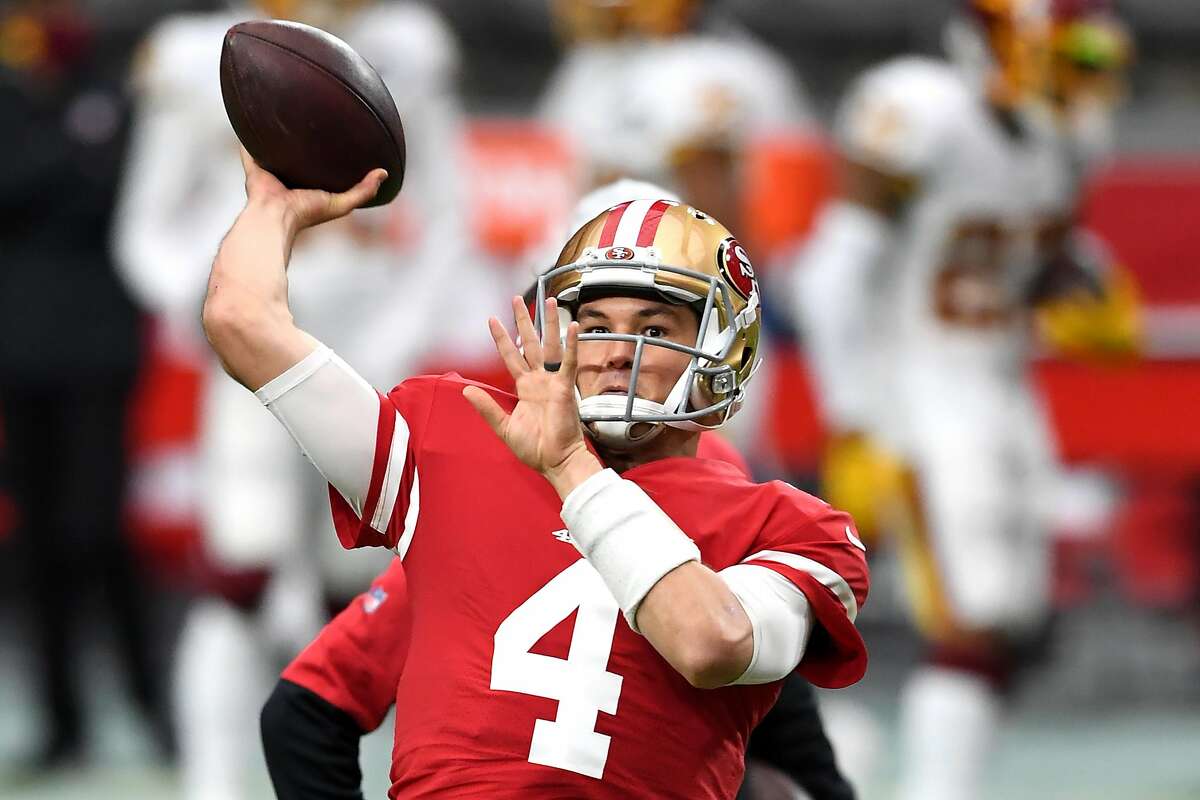 GLENDALE, ARIZONA - DECEMBER 13: Quarterback Nick Mullens #4 of the San Francisco 49ers warms up prior to the game against the Washington Football Team at State Farm Stadium on December 13, 2020 in Glendale, Arizona. (Photo by Norm Hall/Getty Images)