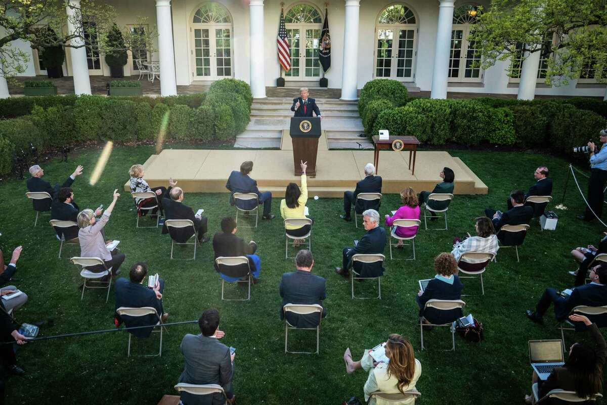 President Trump addresses members of the coronavirus task force and reporters in the audience during a Rose Garden briefing on the pandemic on March 30 in Washington.