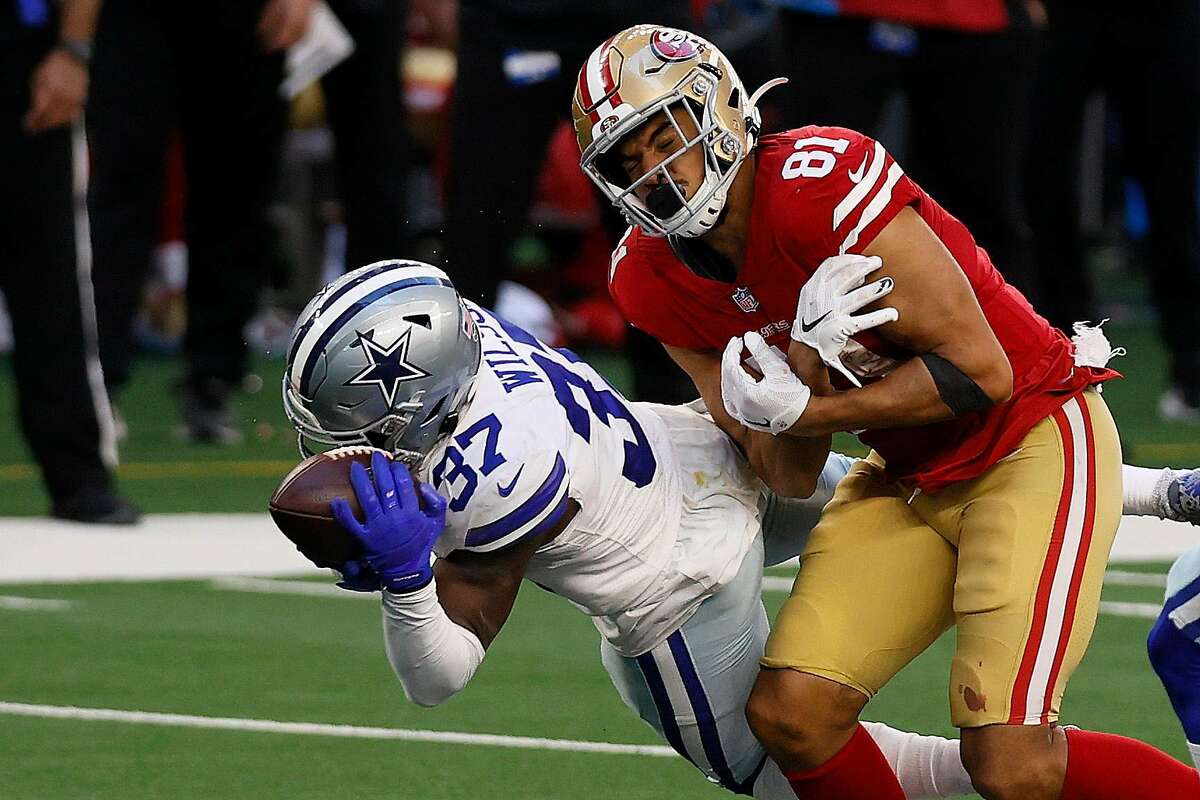 Dallas Cowboys safety Donovan Wilson (37) and linebacker Joe