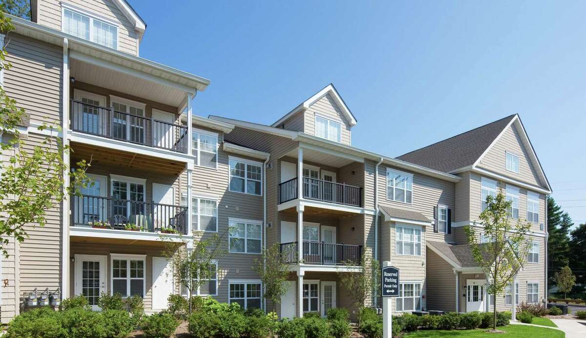 The former Avalon Wilton at Danbury Road apartments in Wilton, Conn., which have been renamed White Oaks at Wilton after Clarion Partners purchased the 100-unit property in December 2020 for nearly $35 million. (Press photo courtesy CBRE)