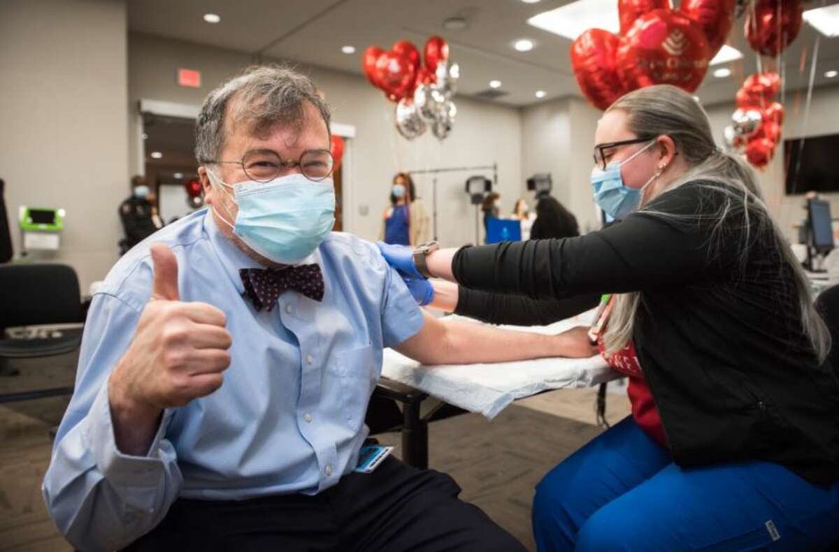 Infectious disease and vaccine expert Dr. Peter Hotez gets his first shot of the Pfizer vaccine, calling it an honor that is mingled with mixed emotions.