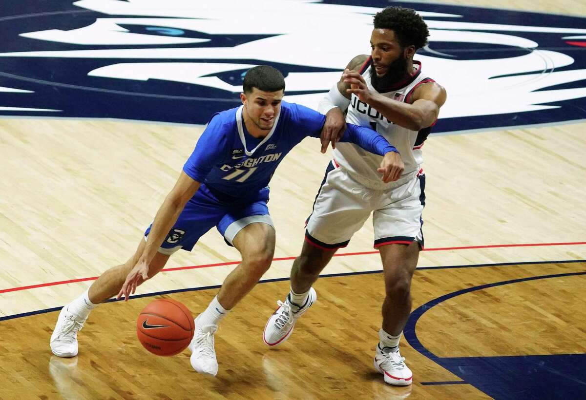 Although he missed two key free throws near the end of regulation, UConn’s R.J. Cole tied up Creighton star Marcus Zegarowski all game on Sunday, then took accountability for his missed free throws afterwards on Twitter (David Butler II/Pool Photo via AP)