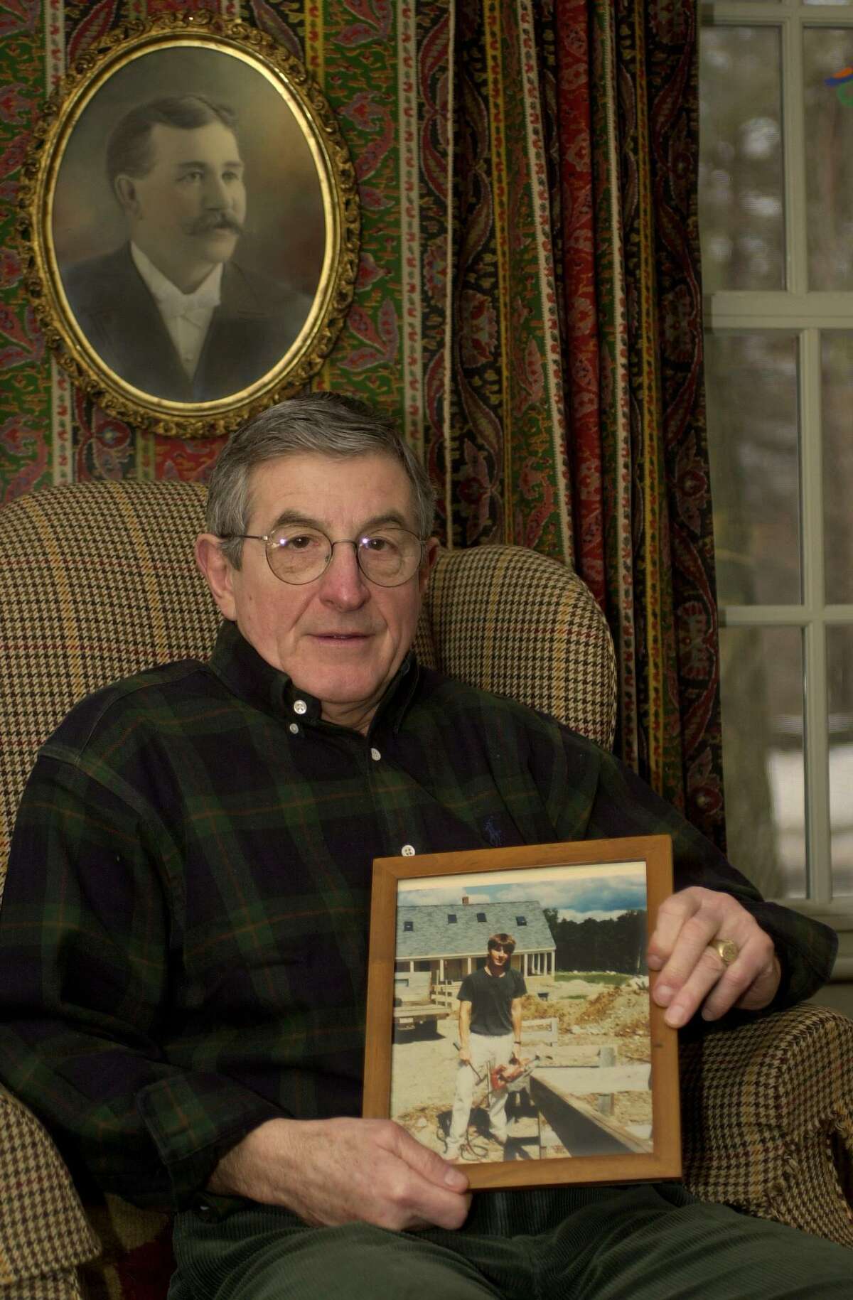 Jack Schultz holds a 1988 photograph of his son Thomas at his home in Ridgefield, Conn., Wednesday, Jan. 31, 2001. Thomas Schultz, a Syracuse University student, was killed in the Pan Am Flight 103 bombing over Lockerbie, Scotland on Dec. 21, 1988.