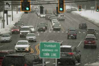 Holiday traffic negotiates the busy intersection of Nichols Avenue and Hawley Lane on the Stratford/Trumbull line on Sunday, December 20, 2020.