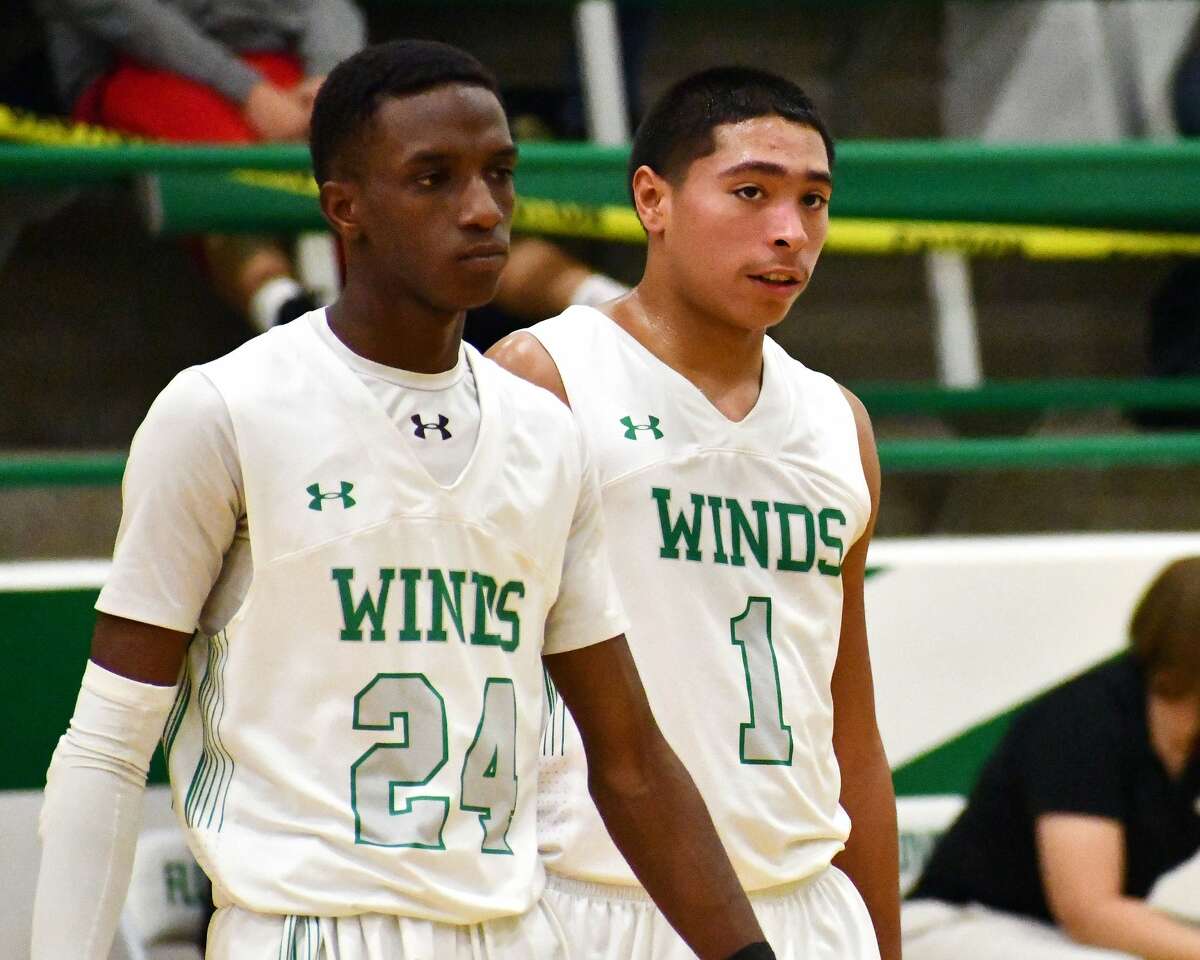 Seniors Desmond Wickware (24) and Quincy Gonzales have the Floydada boys basketball team heading in the right direction after a late start to the season.