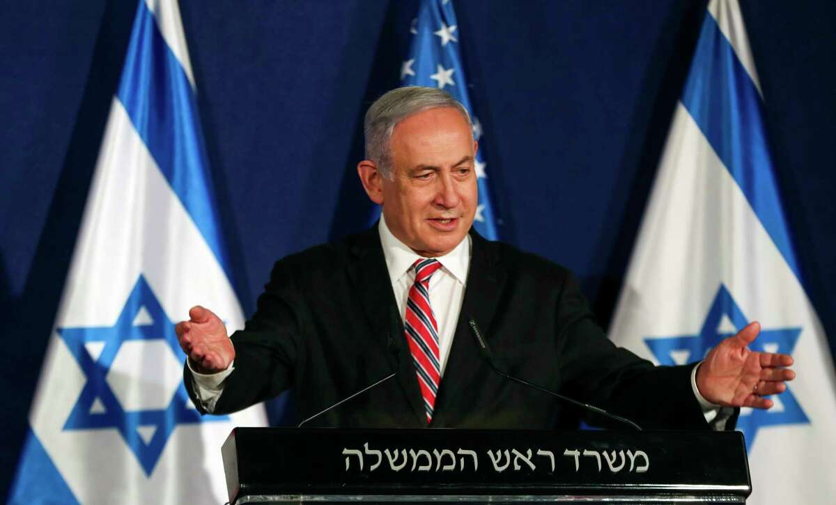 Israeli Prime Minister Benjamin Netanyahu speaks during a news conference with White House senior adviser Jared Kushner in Jerusalem, Monday, Dec. 21, 2020. (Ronen Zvulun/Pool Photo via AP)