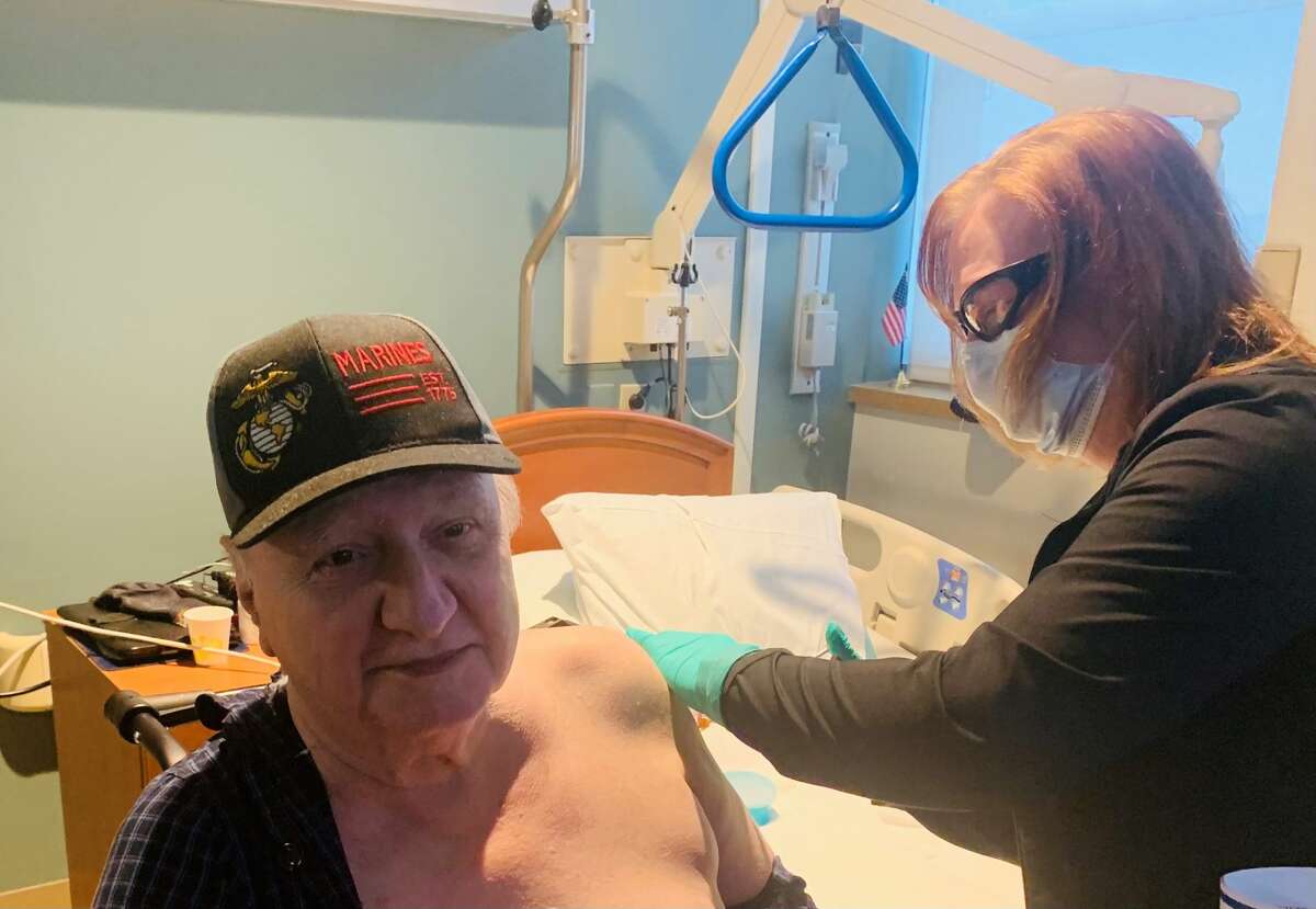 Robert McDonald was the first veteran (United States Marine Corps) to receive a vaccination against COVID-19 at the Stratton VA Medical Center in Albany, N.Y. on Monday, Dec. 21, 2020.