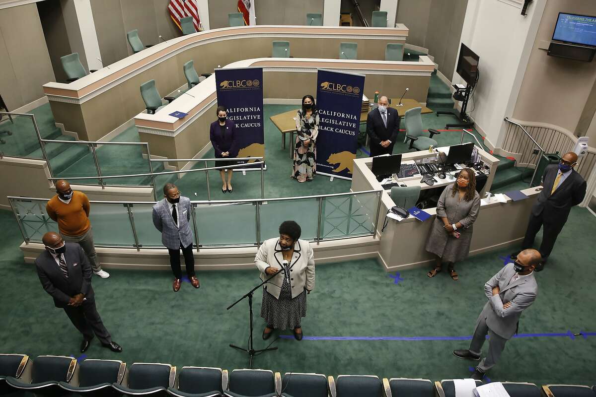 Assemblywoman Shirley Weber, D-San Diego,foreground center, chair of the Legislative Black Caucus, answers a question about police use of force, during a news conference in Sacramento, Calif., Tuesday, June 2, 2020. On Tuesday, Dec. 22, 2020, Gov. Gavin Newsom announced he had picked Weber to replace Alex Padilla as Secretary of State. Padilla was selected by Newsom to replace Kamala Harris as one of the state’s two U.S. Senators following her election as Vice-president-elect with Joe Biden.