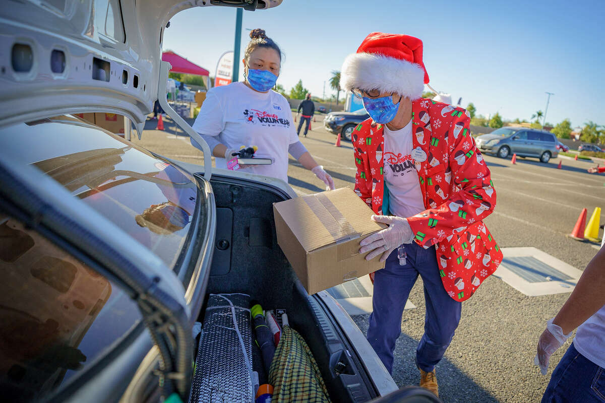 Volunteers deliver food donations at Disneyland on December 21, 2020.