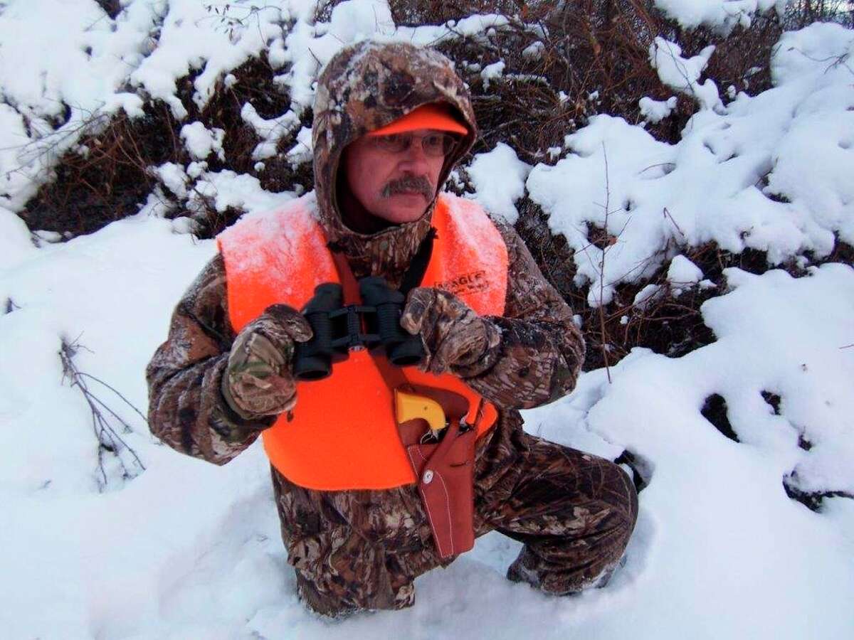 Tom Lounsbury appreciates the fact that a holstered handgun allows both hands to be free for glassing, as well as for going through rugged cover. (Photo provided/Tom Lounsbury/Hearst Michigan)