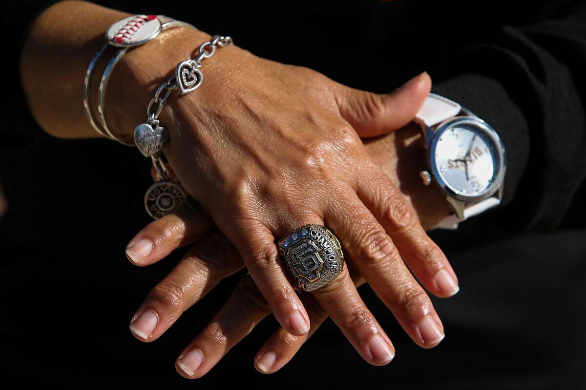 Renel Brooks-Moon, the San Francisco Giants’ public-address announcer since 2000, shows off her 2014 World Series ring.