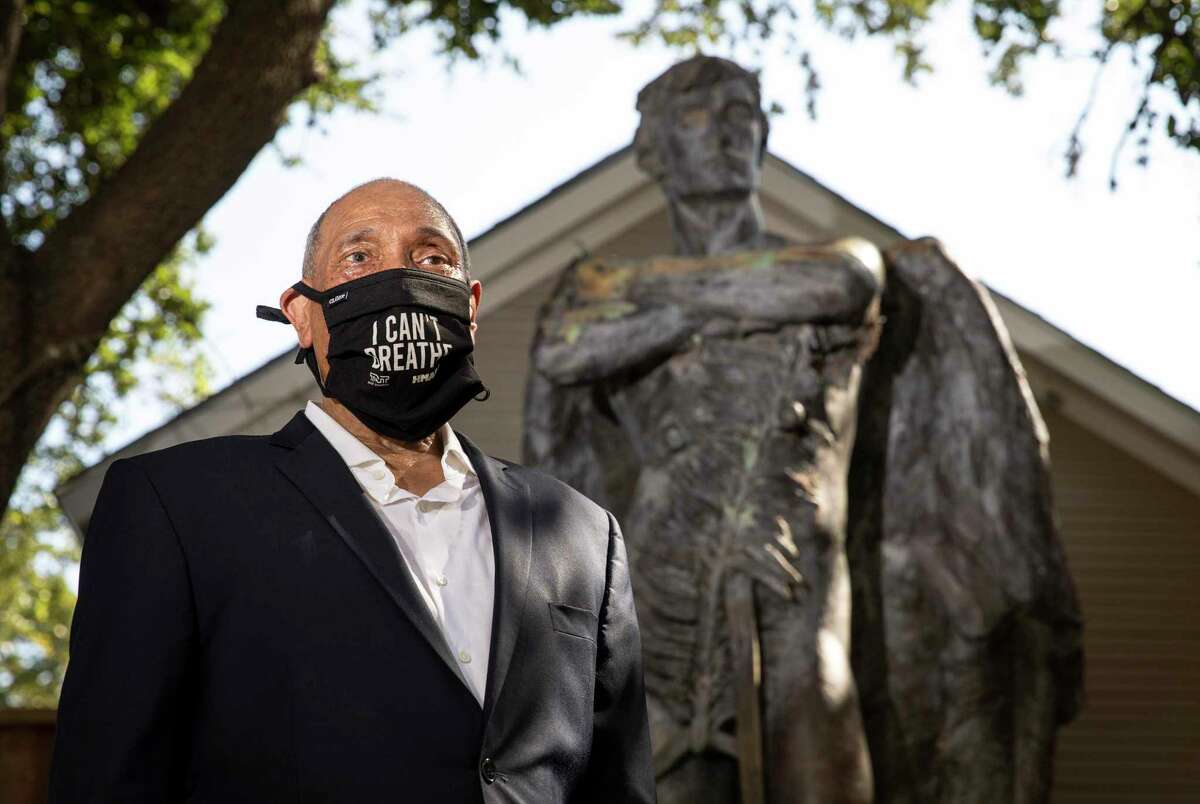 John Guess, Jr., CEO of the Houston Museum of African American Culture, poses for a portrait next to "Spirit of the Confederacy," the statue removed from Sam Houston Park in June, on Tuesday, Aug. 18, 2020, at the museum in Houston. “This isn’t about the monument. It’s about having a multi-cultural conversation on race,” Guess said.