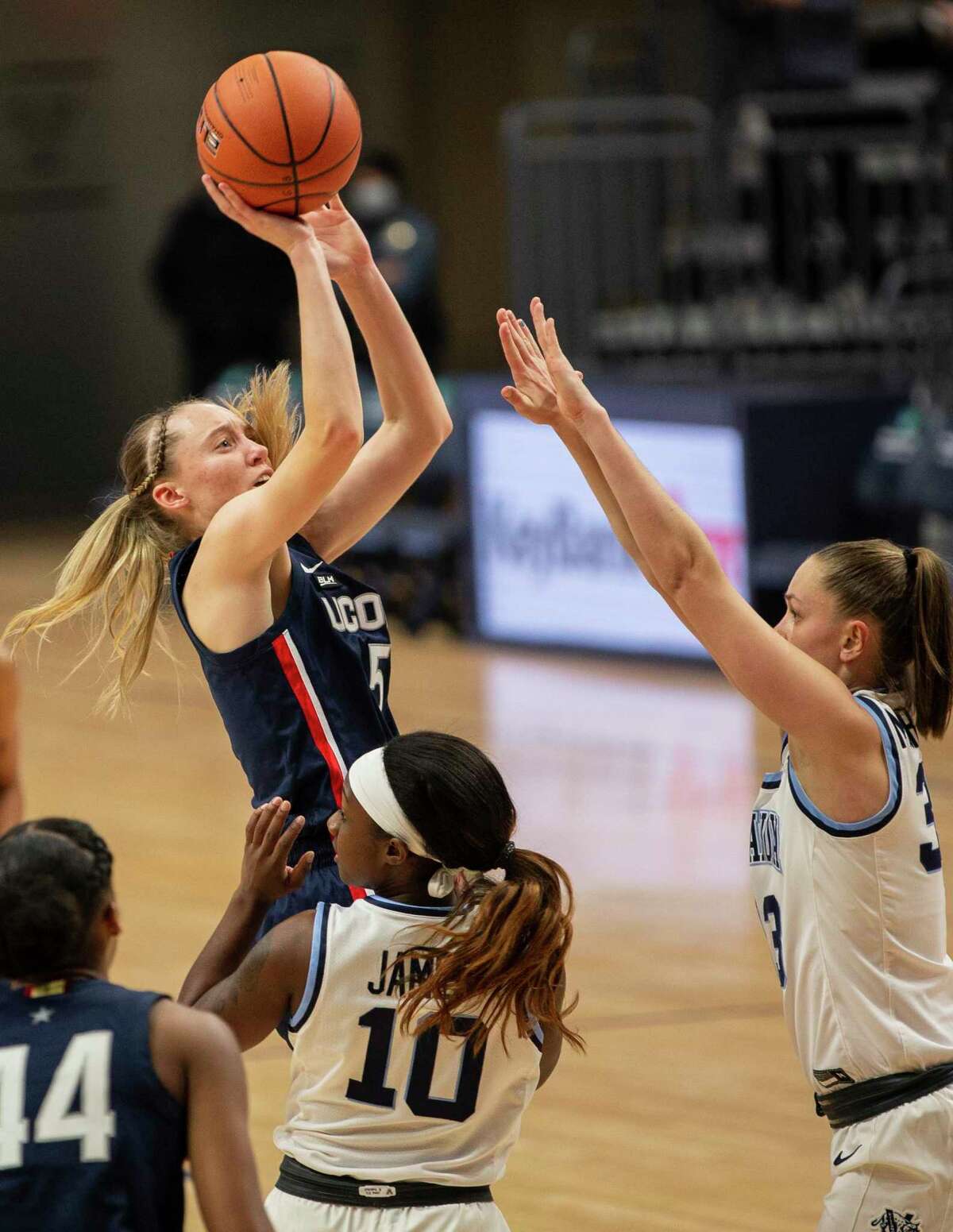 UConn guard Paige Bueckers (5) shoots over Villanova forward Sarah Mortensen during the second half on Tuesday.