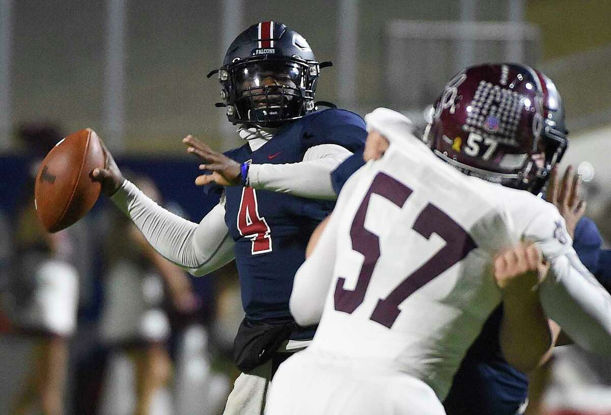 Tompkins quarterback Jalen Milroe (4) throws a pass during the first half of a 6A Division I Region III area round high school football playoff game against Cy-Fair, Friday, Dec. 18, 2020, in Katy, TX.