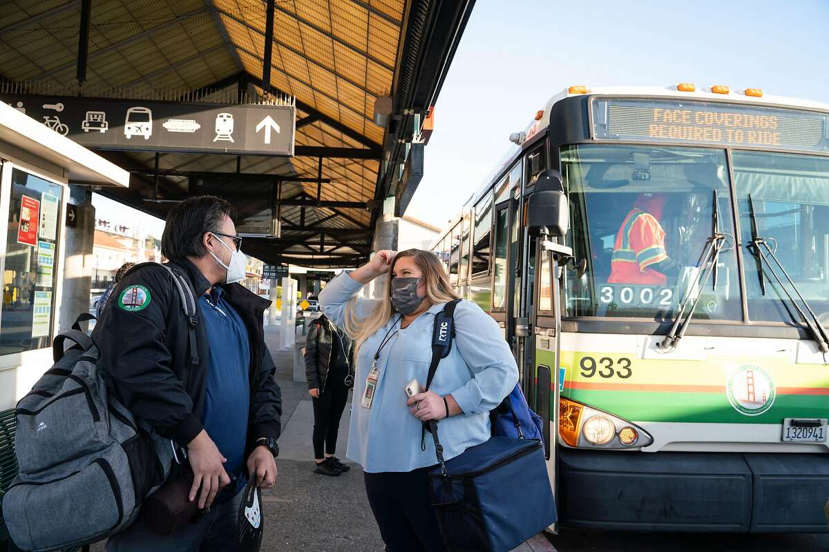 Golden Gate Transit's Rainier Diaz and JorDann Crawford talk at the San Rafael Transit Center.