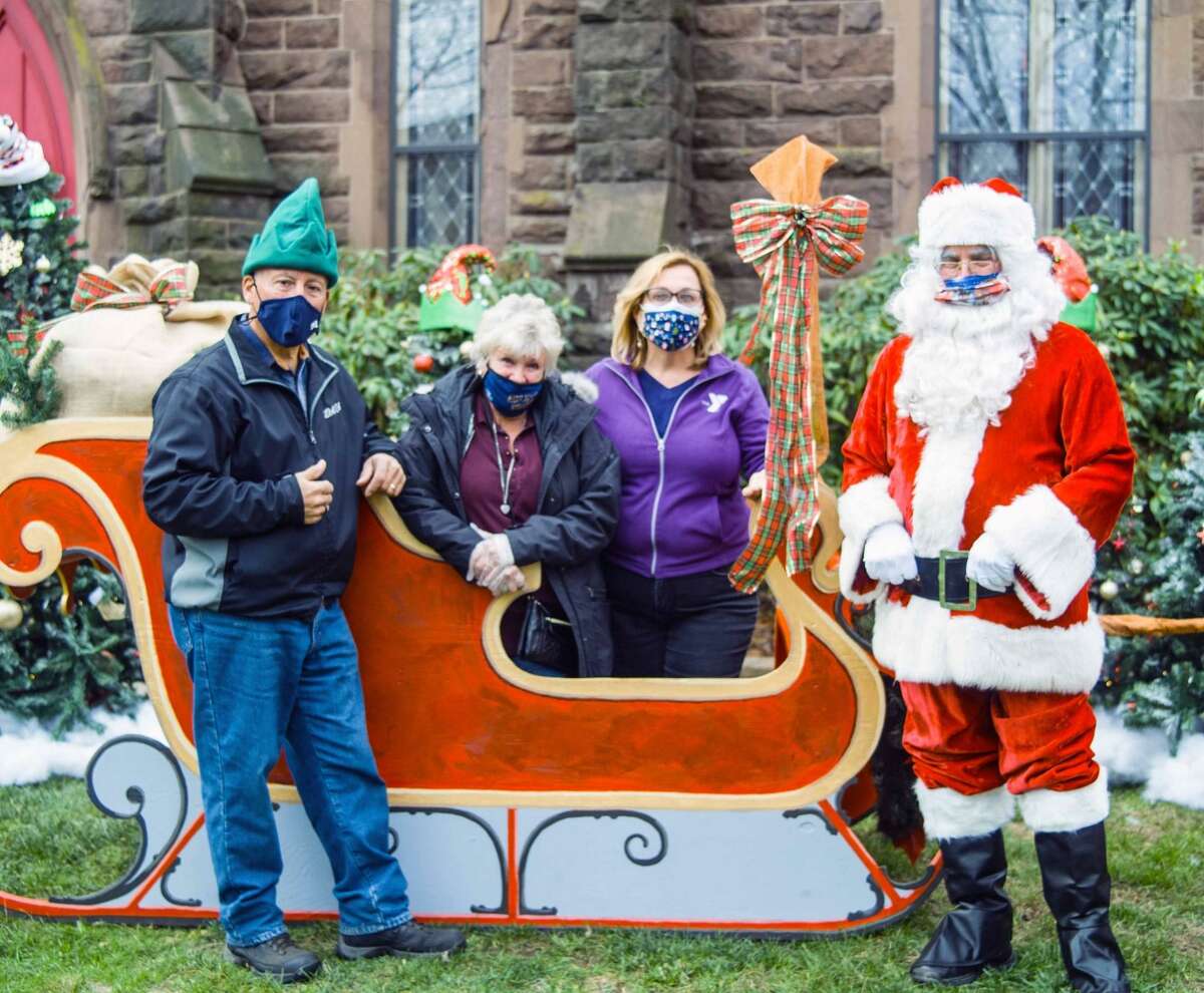 Middletown’s Santa Claus of 33 years, retired fire marshal Al Santostefano, delighted those who participated in the recent Holiday on Main festivities downtown in COVID-19 friendly fashion. Artists at Kidcity Museum created a sleigh with Plexiglass separating children and families from Santa, who posed for photographs over 6 feet away on a red Vespa.