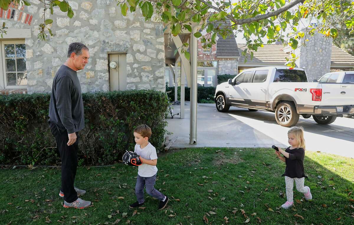 Former Giants manager Bruce Bochy, with his grandkids Braxton,2, and Blakely,2 Bochy at his home in Poway, California on Monday, December 21, 2020.(Photo by Sandy Huffaker/Special to The Chronicle)