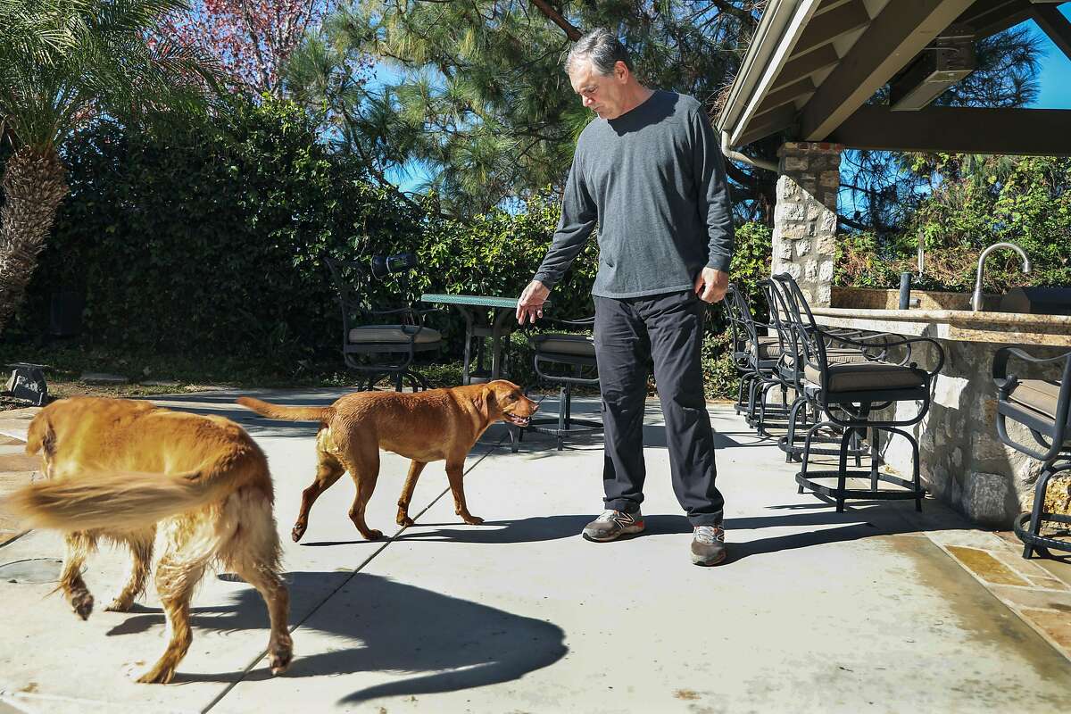 Former Giants manager Bruce Bochy, with his Loa and Elle at his home in Poway, California on Monday, December 21, 2020.(Photo by Sandy Huffaker/Special to The Chronicle)
