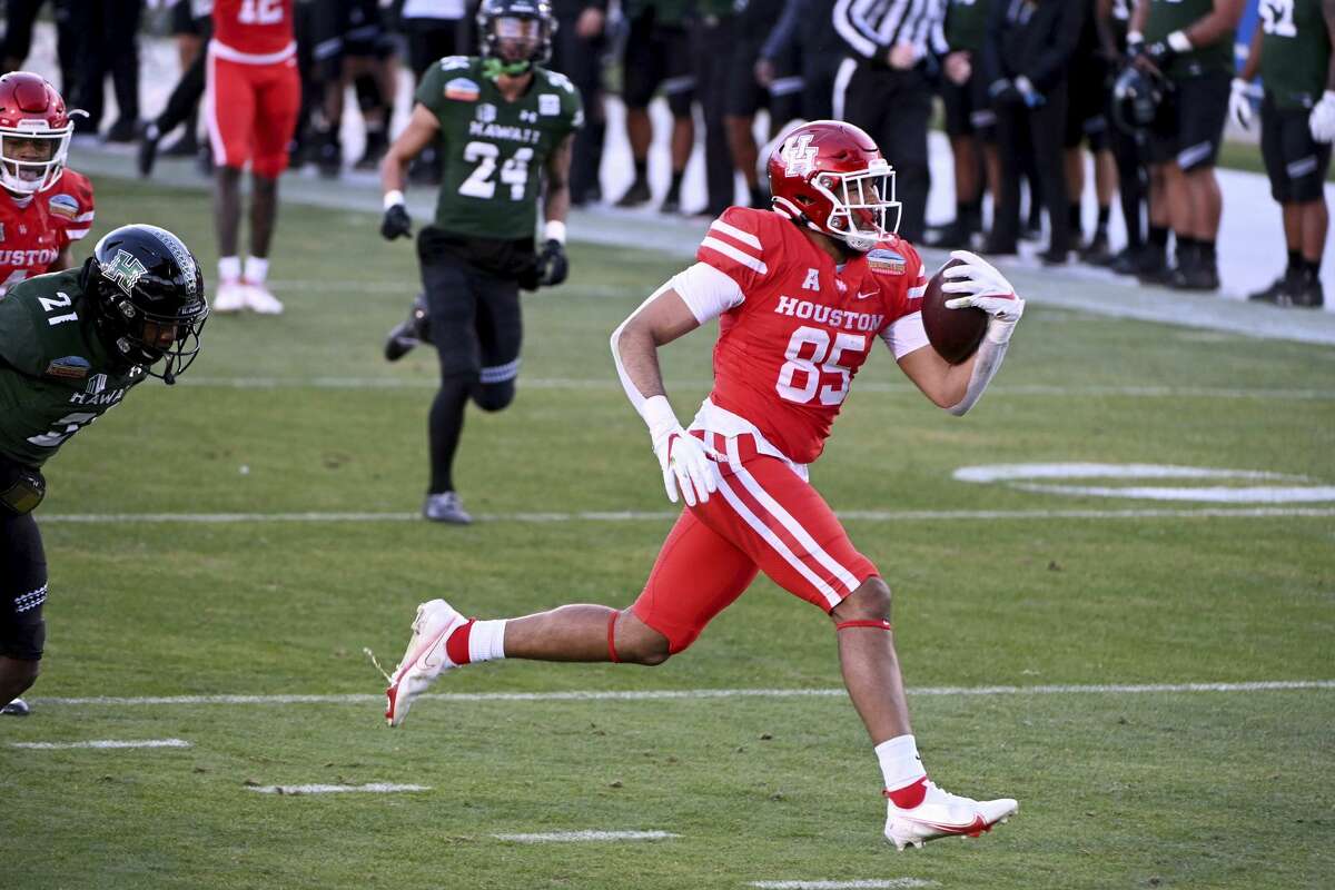 Houston tight end Christian Trahan (85) runs for a touchdown in the third quarter of the New Mexico Bowl NCAA college football game in Frisco, Texas, Thursday, Dec. 24, 2020. (AP Photo/Matt Strasen)
