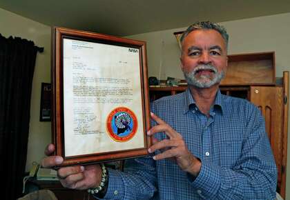 Karl Koegel is holding one of many letters that he has received from NASA about his father Ewald Koegel.  After Ewald Koegel left Germany in the late 1950s, he worked on the space medicine program at Brooks AFB in San Antonio.  He died in Heidelberg in November 2020.