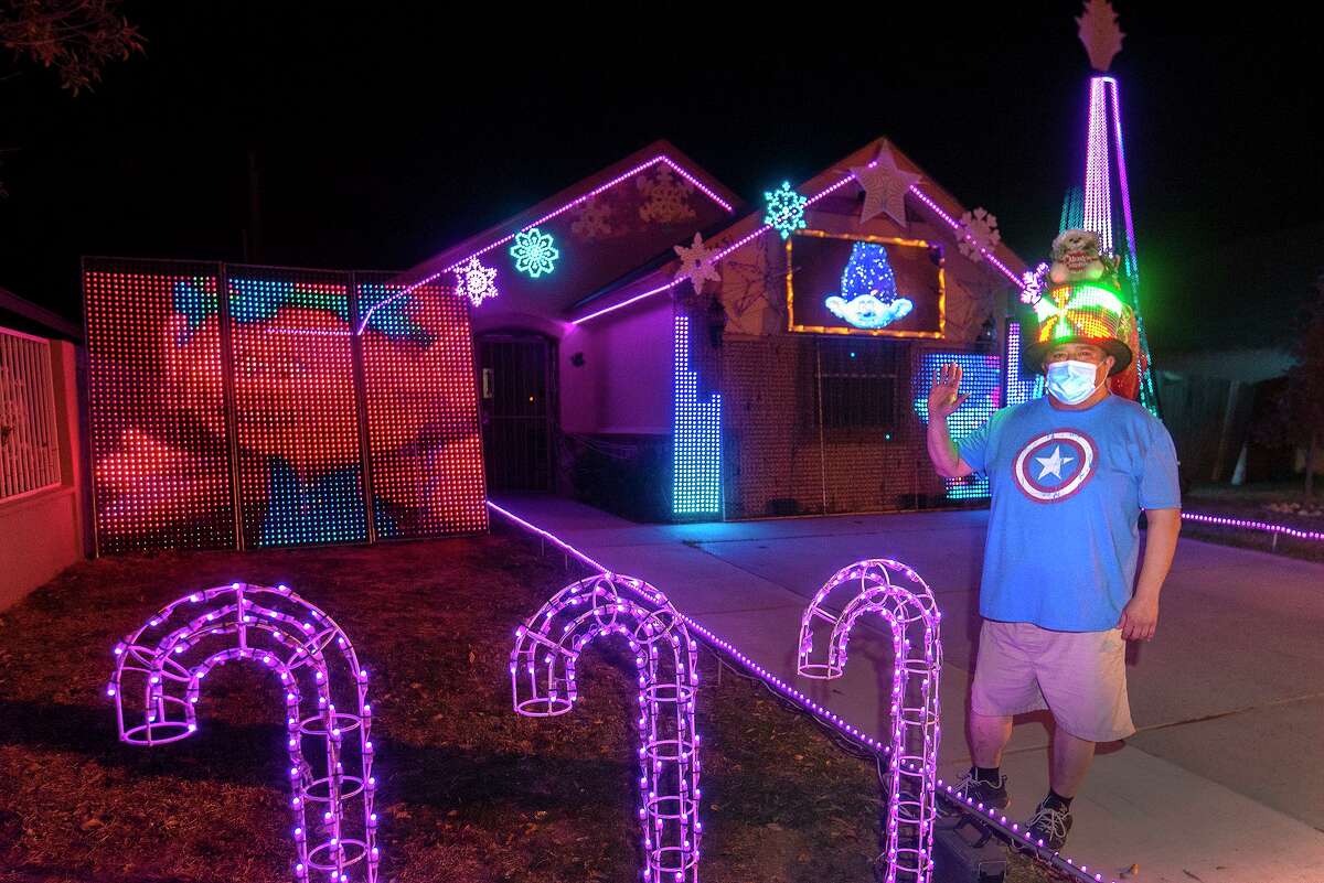 Tomas Rodriguez is pictured in front of his Christmas light show on Tuesday, Dec. 23 outside his home located at 1431 Wilfrano Dr.