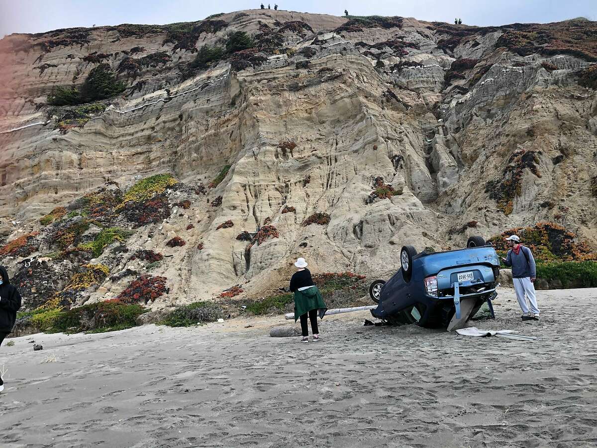 A woman was in serious condition but apparently survived after her car drove off a cliff at Fort Funston Beach Friday morning, plunged 120 feet√ and landed upside-down on the sand, the San Francisco Fire Department reported.