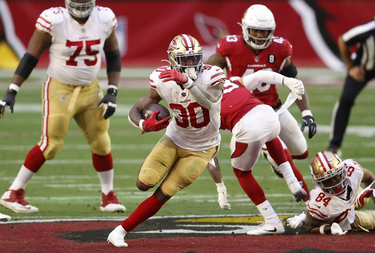 GLENDALE, ARIZONA - DECEMBER 26: Running back Jeff Wilson Jr. #30 of the San Francisco 49ers rushes the football during the first half against the Arizona Cardinals at State Farm Stadium on December 26, 2020 in Glendale, Arizona. (Photo by Christian Petersen/Getty Images)
