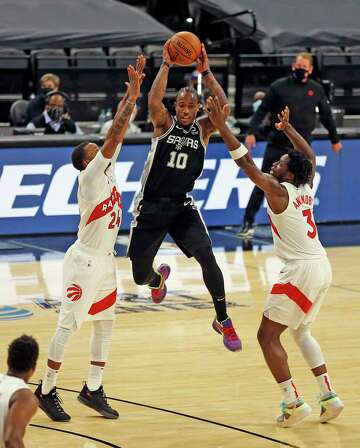 DeMar DeRozan, Dejounte Murray's triple-double lead Spurs past Raptors - HoustonChronicle.com